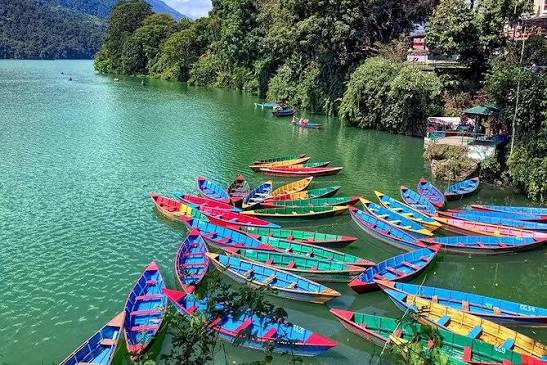 Phewa Lake boats and hills